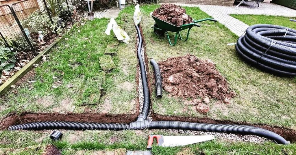French Drain Installed in Lawn by HF Projects